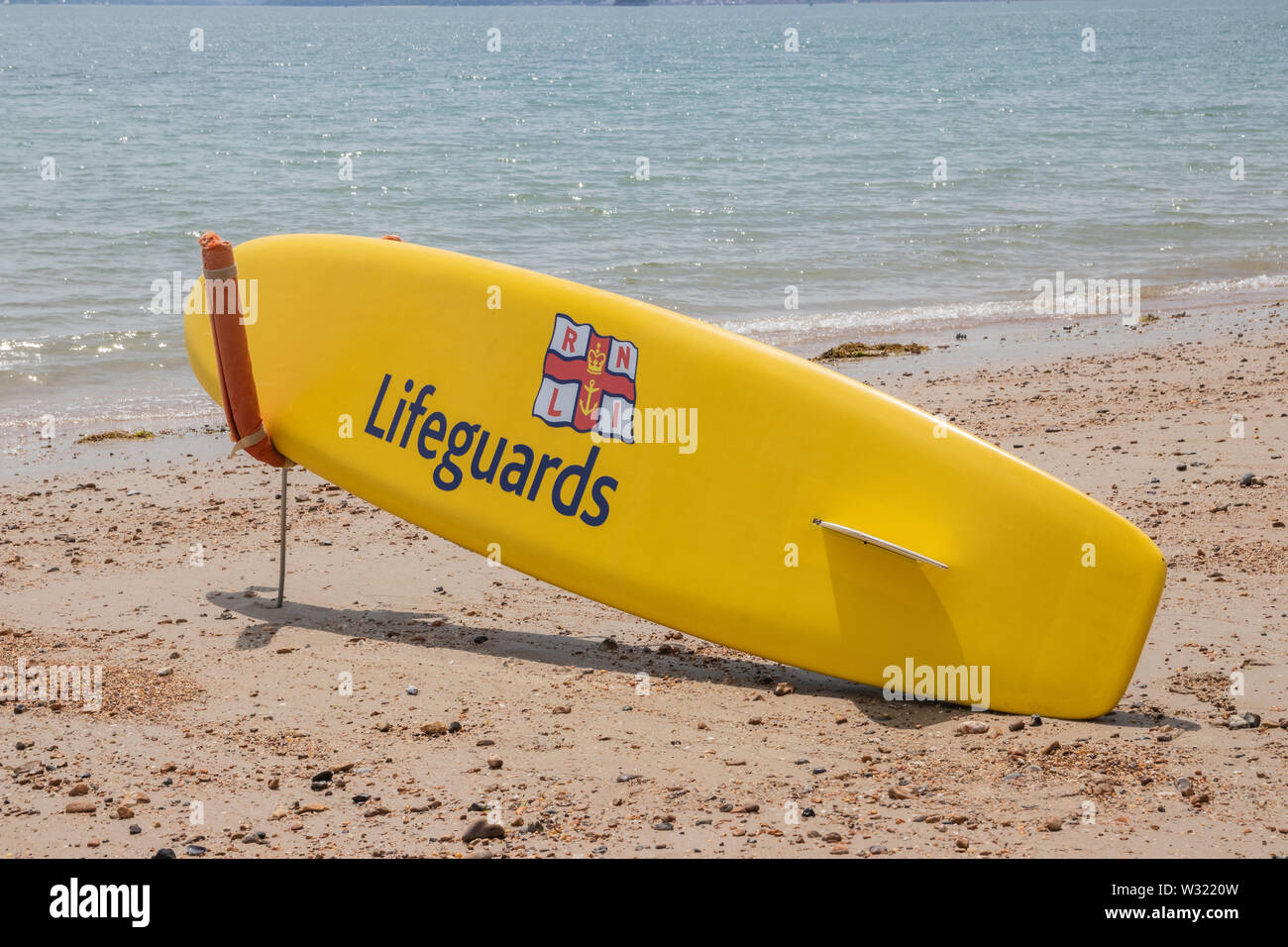 A lifeguards surfboard Stock Photo Alamy