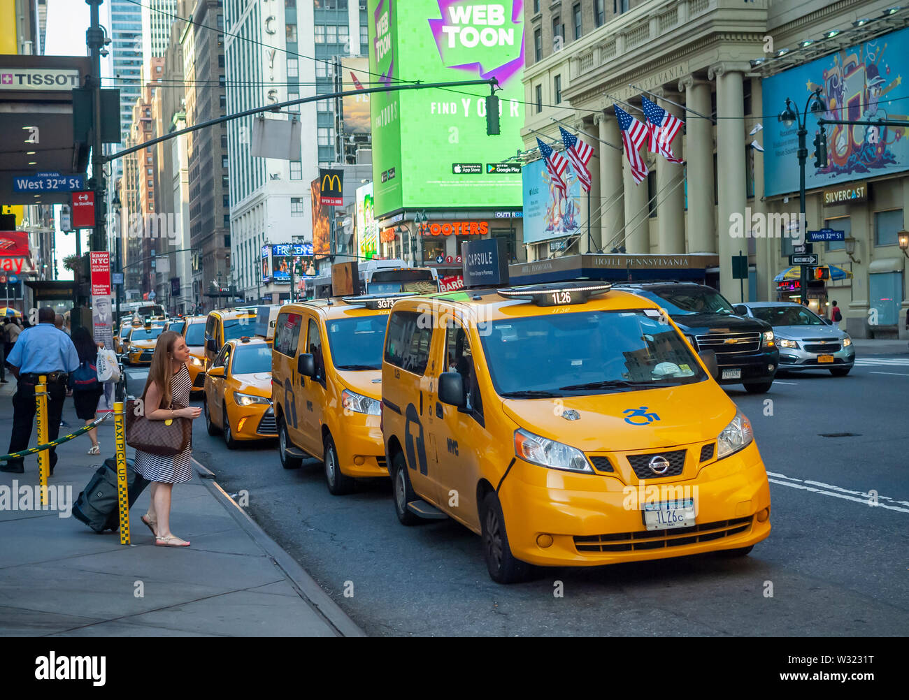 A taxi line in front of the Pennsylvania Station in New York on Tuesday, July 9, 2019.  (© Richard B. Levine) Stock Photo