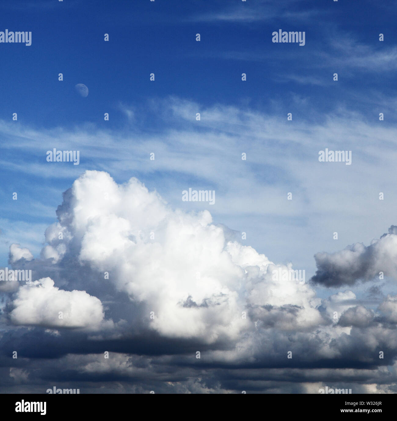 Cloud formation, Cumulus, Cirrus, clouds, blue sky, Moon, weather, formations, skies Stock Photo