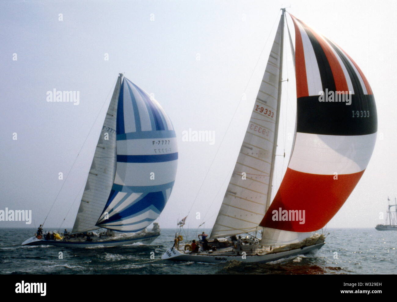 AJAXNETPHOTO. 29TH AUGUST,1981. PORTSMOUTH, ENGLAND. - WHITBREAD RACE START - (L-R) GAULOISE 3 (FR) SKIPPERED BY ERIC LOIZEAU AND ROLLY GO (IT) SKIPPERED BY GIORGIO FALCK. PHOTO : JONATHAN EASTLAND / AJAX REF:908973 Stock Photo