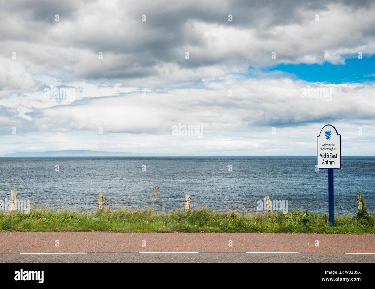 Looking across the Irish Sea towards Scotland from the Coast Road, County Antrim, Northern Ireland Stock Photo