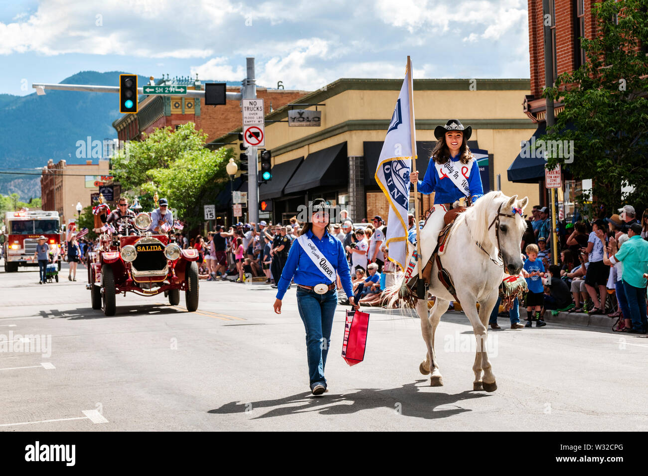 Rodeo Queen riding her horse; Annual Fourth of July Parade in the small