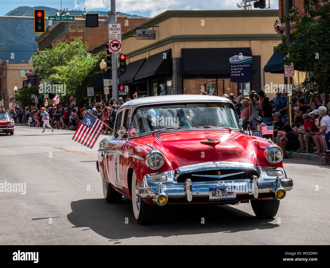 1955 Studebaker President classic car driving in the annual Fourth of July Parade; small mountain town of Salida; Colorado; USA Stock Photo