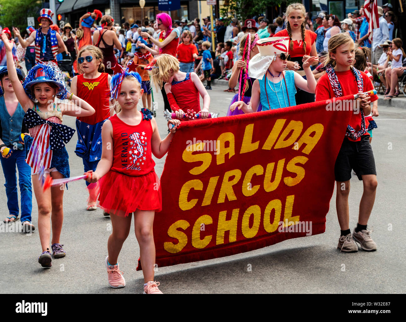 Salida Circus School marches in annual Fourth of July Parade; small mountain town of Salida; Colorado; USA Stock Photo