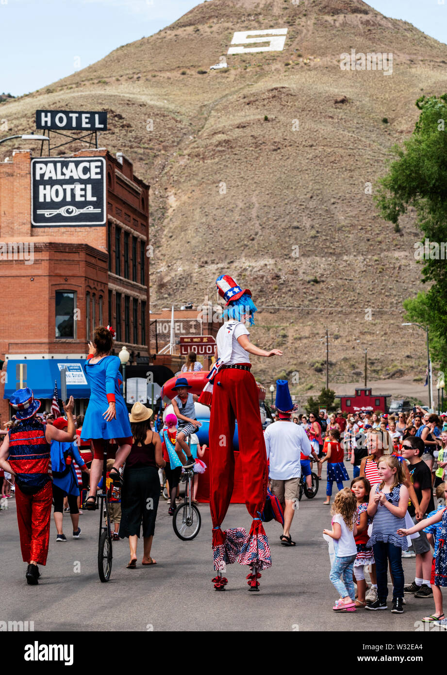 Woman on stilts; Salida Circus School; annual Fourth of July Parade; small mountain town of Salida; Colorado; USA Stock Photo