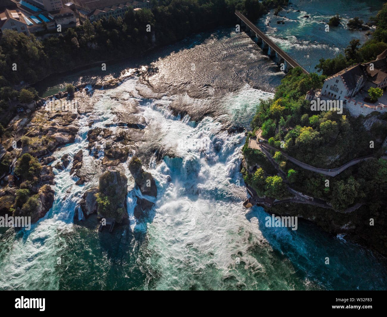 Rhine Falls (Rheinfall) waterfalls with Schloss Laufen castle ...