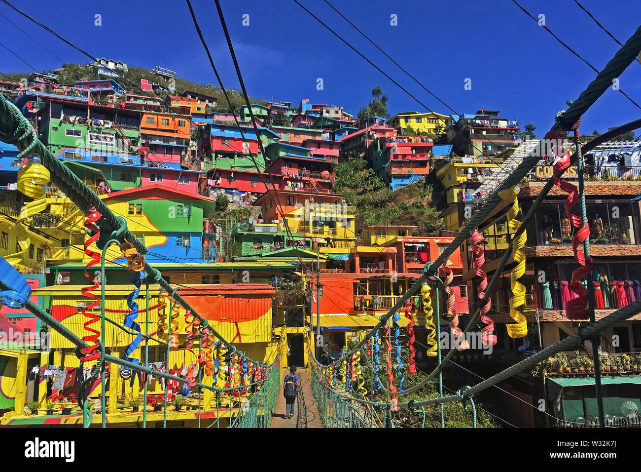 The Colors of StBoSa or the StoBoSa Hillside Homes Artwork, a community designed artwork by the Tam-awan village group, is a tourist destination. Stock Photo