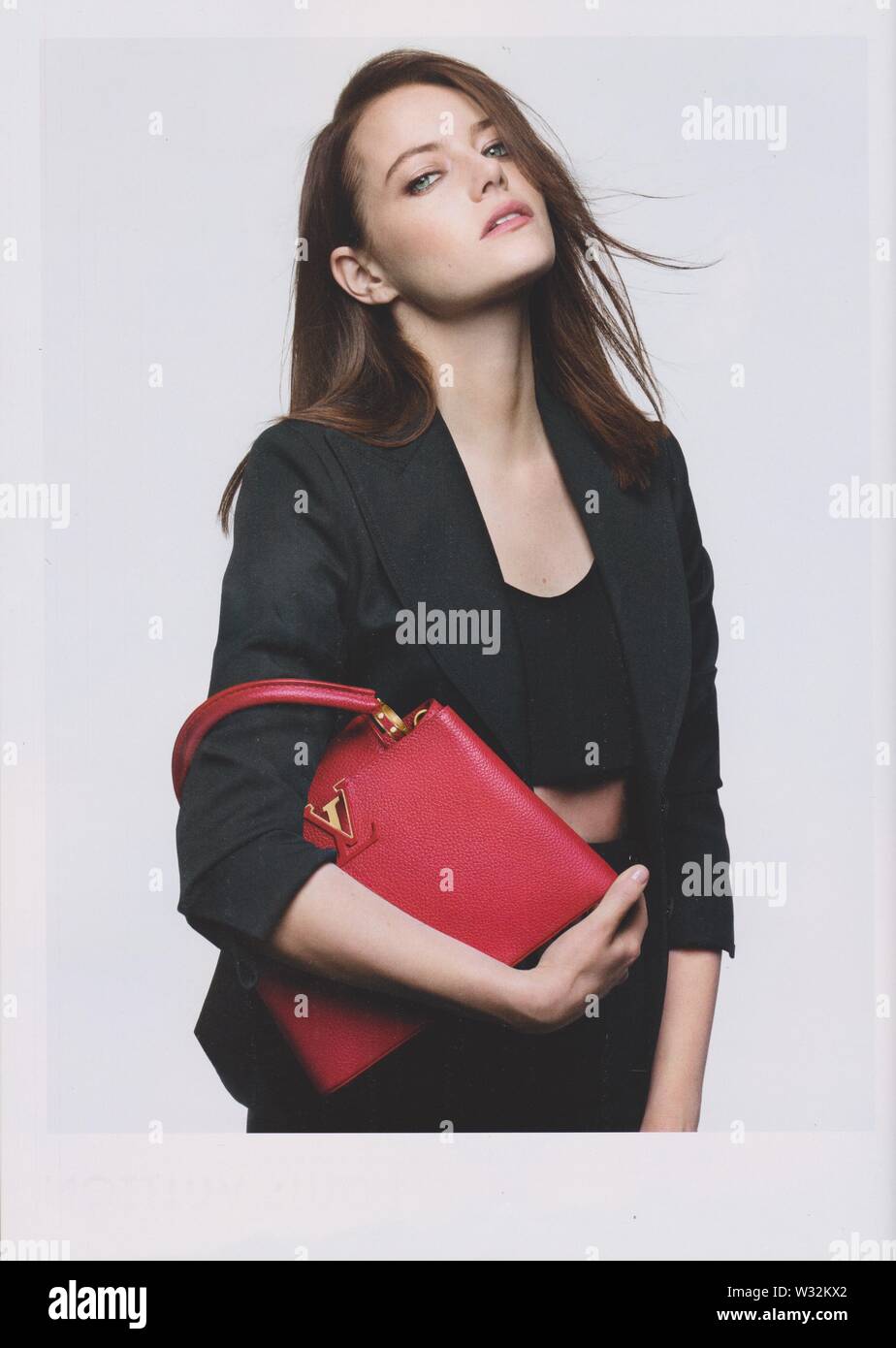 poster advertising Louis Vuitton handbag with Emma Stone actress