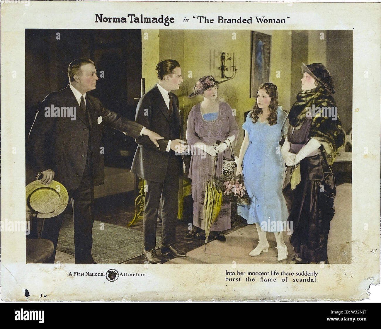 Lobby card for the American film The Branded Woman Stock Photo Alamy