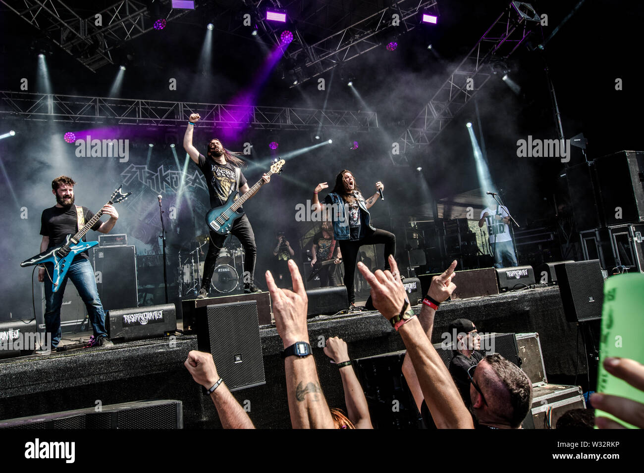 Strikeback band perform during the Resurrection Fest music festival in Viveiro, northern Spain.Resurrection Fest is a music festival of extreme music, metal, hardcore, punk, stoner and doom. This was the 14th edition. It featured international bands like Slipknot, Slayer, Parkway Drive, Brant Bjork, Radio Moscow, Within Temptation, Lamb of God or King Diamond. Stock Photo