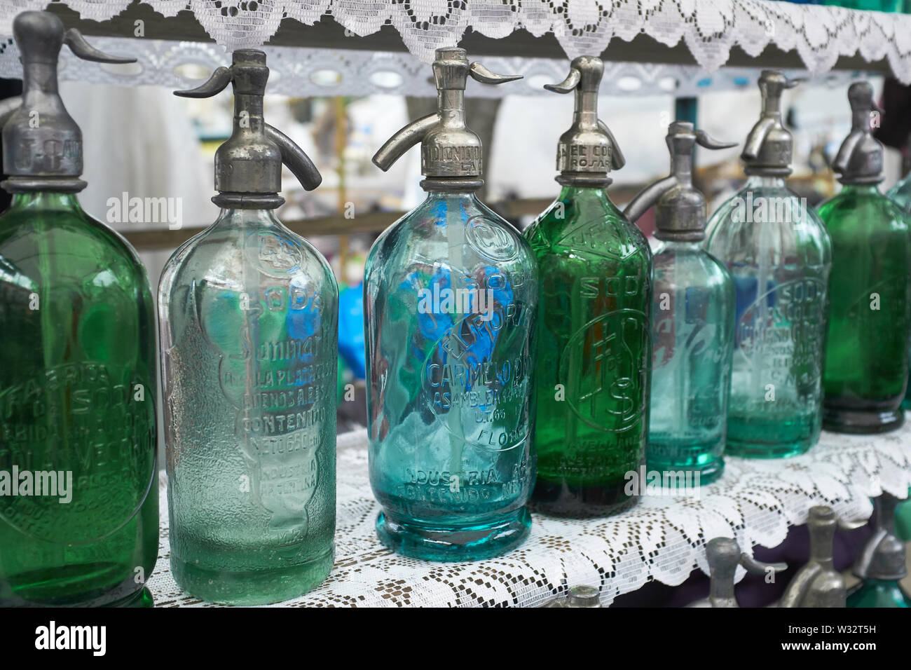 Antique siphon bottles in Mercado de San Telmo, the oldest neighbourhood of Buenos Aires, Argentina. Stock Photo