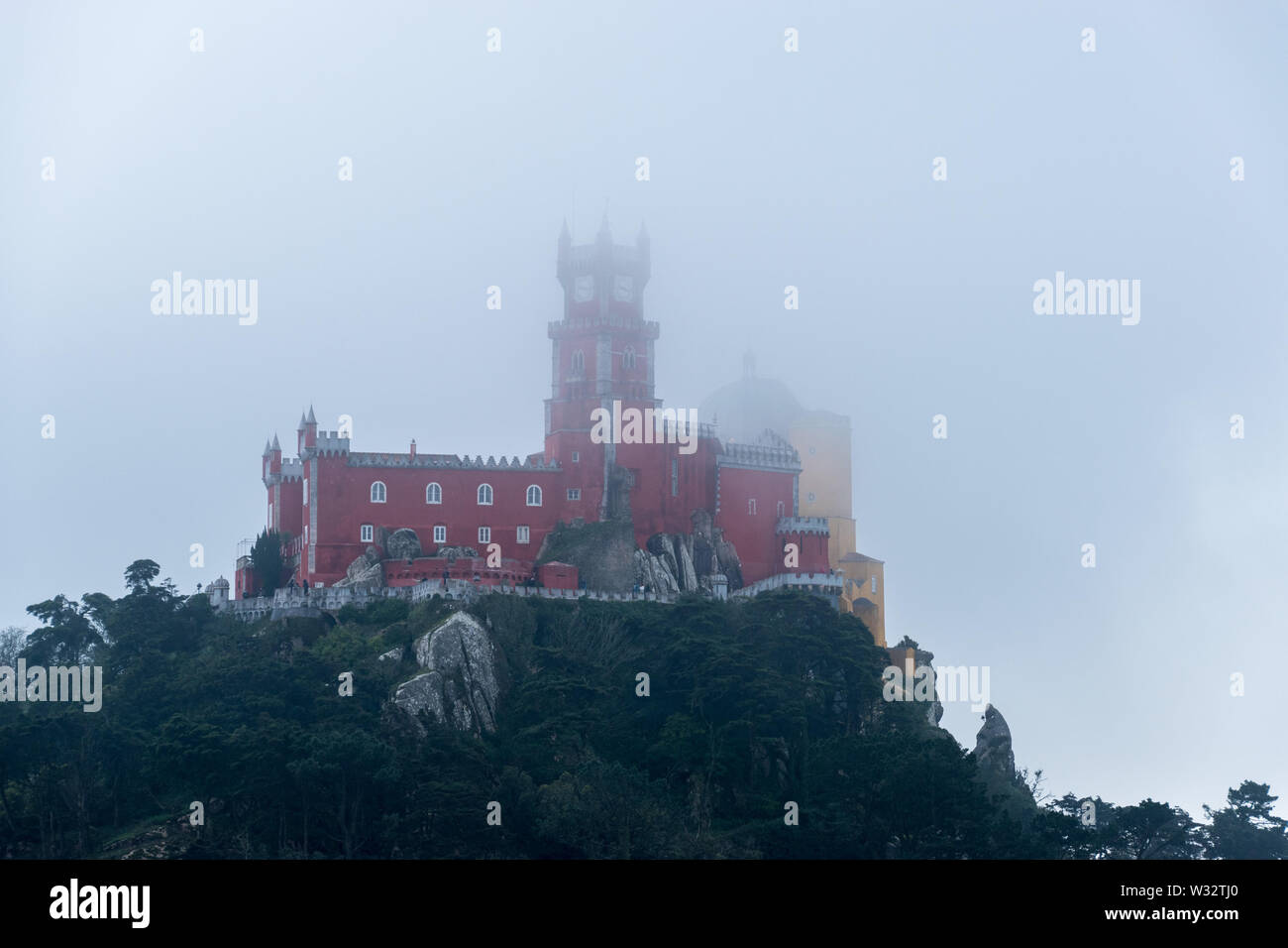 The Palace of Pena during fog in Sintra, Portugal Stock Photo