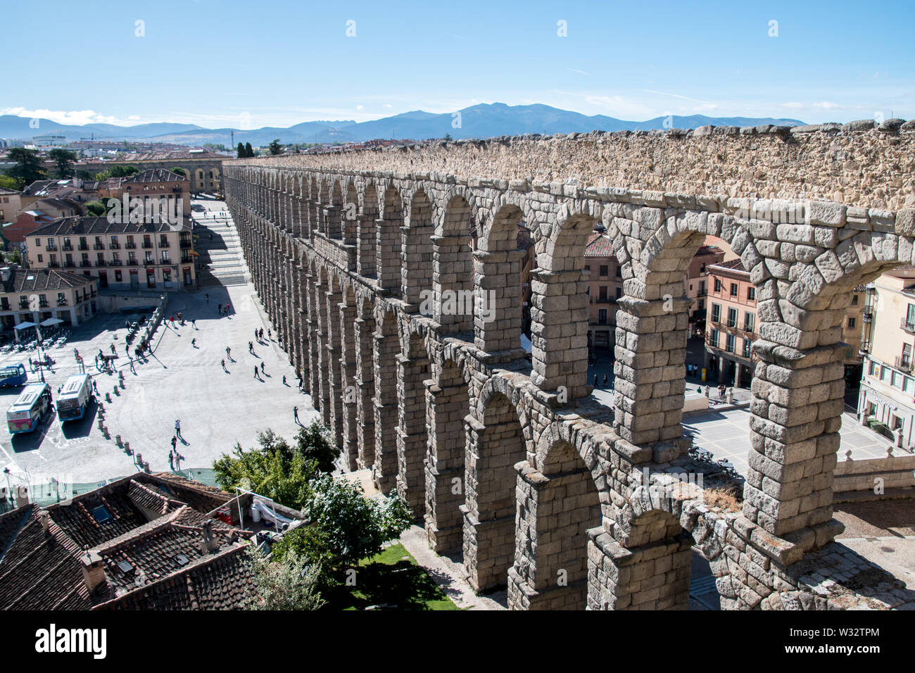 The Aqueduct of Segovia is a Roman aqueduct in Segovia, Spain. It is one of the best-preserved elevated Roman aqueducts and the symbol of Segovia. Stock Photo