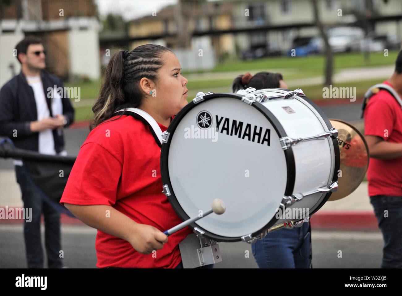 High school teenagers in real marching band at Elks Parade Stock Photo