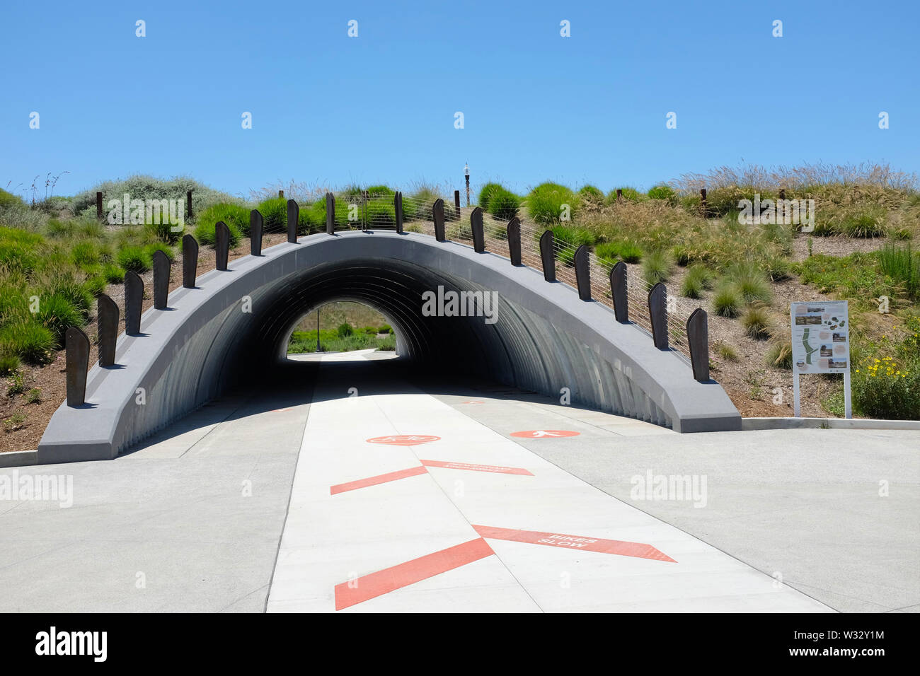 IRIVNE, CALIFORNIA - JULY 11, 2019: The Cultivate underpass allows pedestrians and cyclists to travel unimpeded in the Bosque open space area of the G Stock Photo
