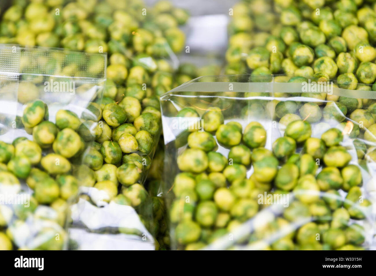 Packages of roasted green wasabi peas in Tsukiji outer street fish
