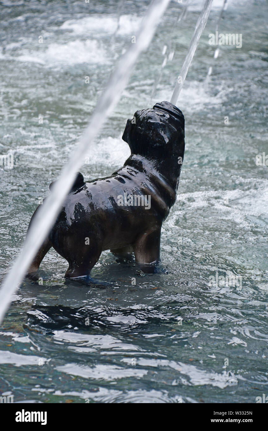 The iconic Dog Fountain at Berzcy Park in downtown Toronto Stock Photo