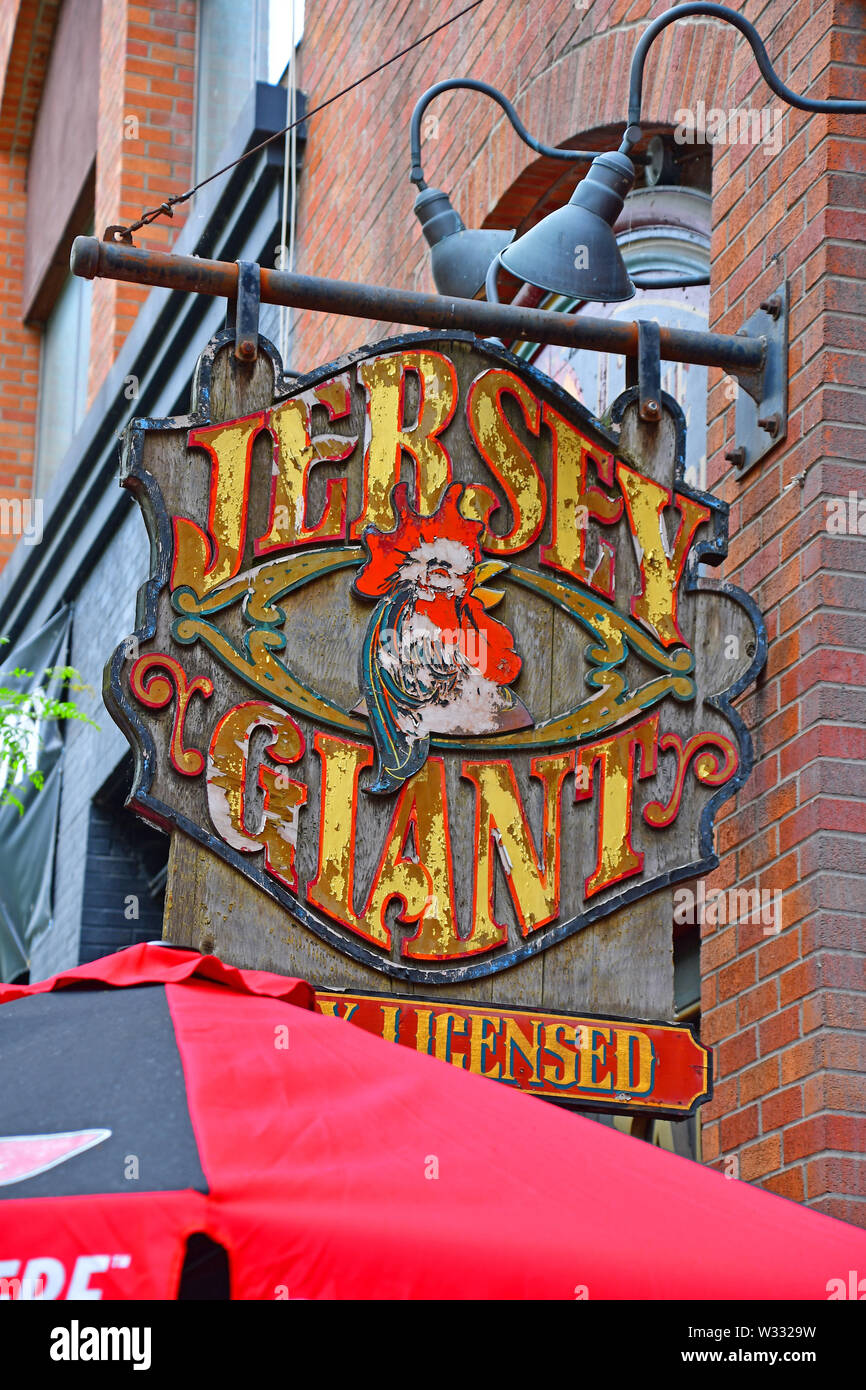Shop signs along Front Street in the St. Lawrence Market section of Toronto Stock Photo Alamy