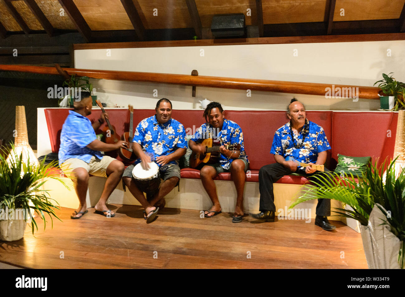 Local Polynesian musicians performing at the Tamanu Beach Island Feast Dance Show, Aitutaki, Cook Islands, Polynesia Stock Photo