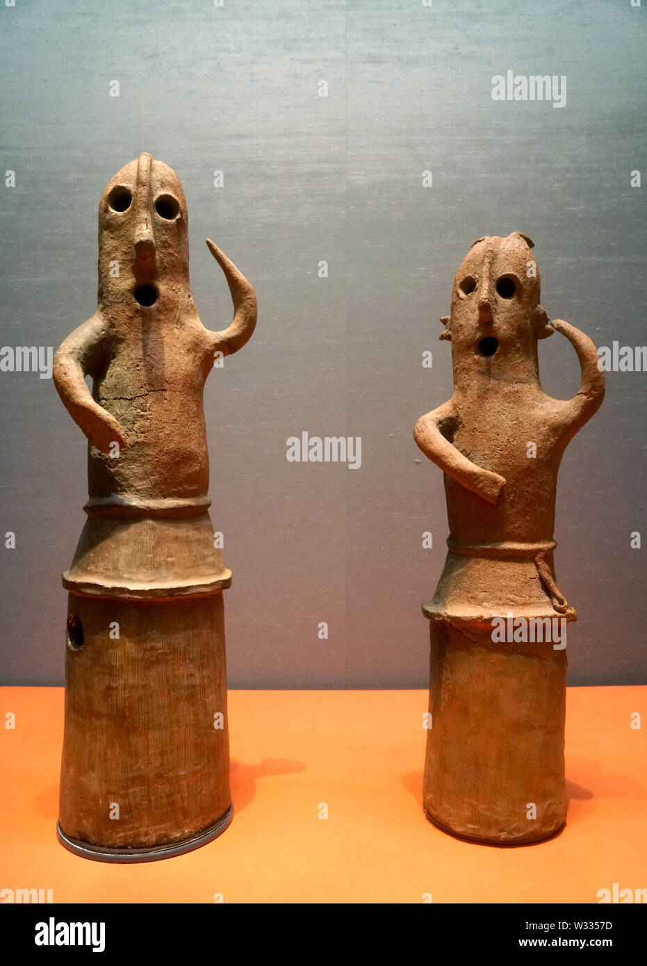 Haniwa (terracotta tomb figurine) man and woman dancing, Kofun period