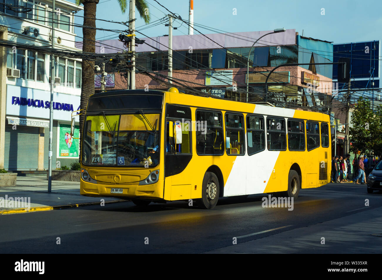 SANTIAGO, CHILE - FEBRUARY 2017: A yellow Transantiago bus in Puente