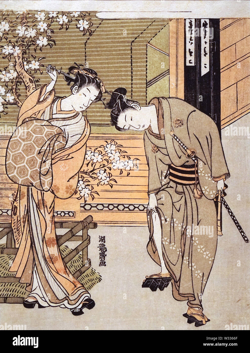 Courtesan and Handsome Youth inder a Cherry Tree, by Isoda Koryusai, woodblock print, Edo period, 18th century Stock Photo