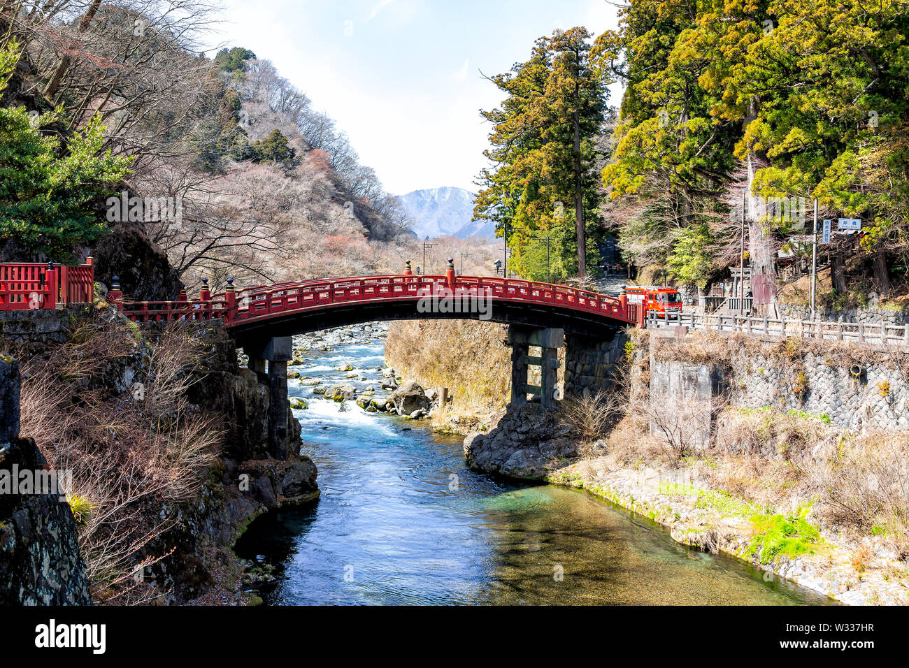 Nikko, Japan - April 4, 2019: View on mountains and famous red bridge  landmark in Tochigi prefecture with blue water in early spring Stock Photo  - Alamy