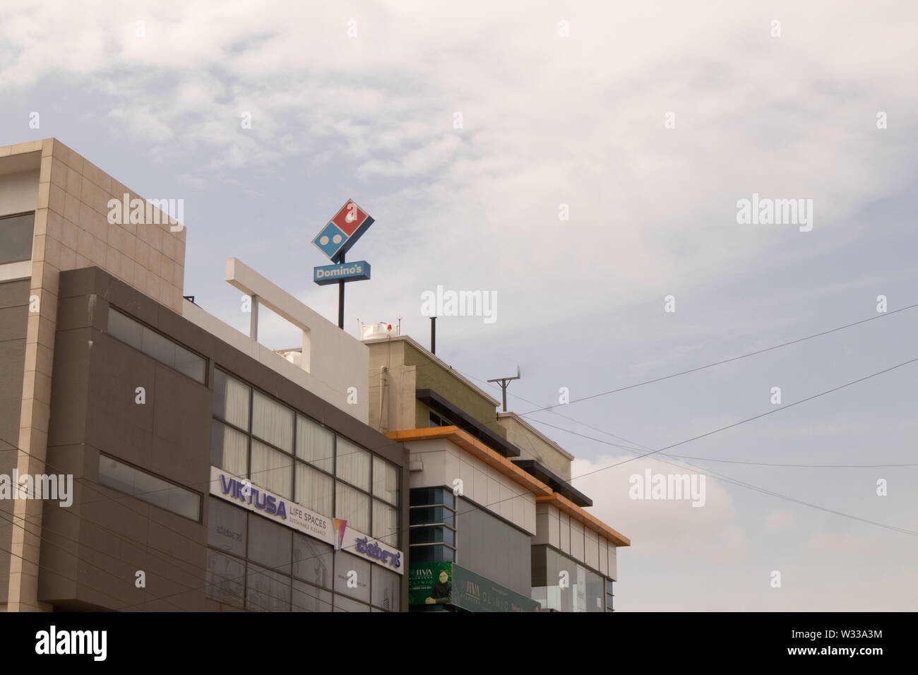 Bengaluru, India June 27,2019 : Domino's Pizza billboard on top of the building at Bengaluru. Stock Photo