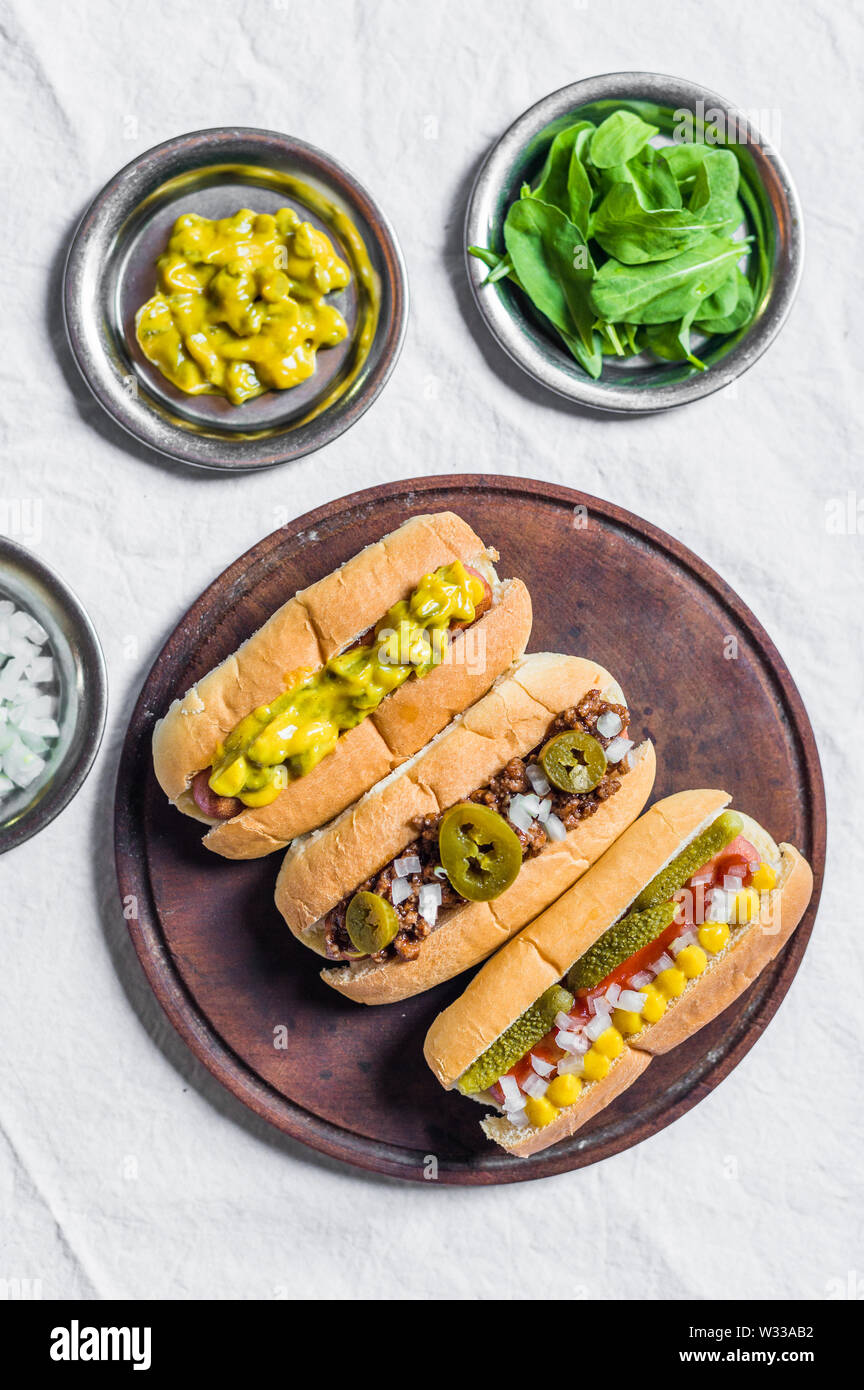 Selection of classic hot dogs against white background Stock Photo