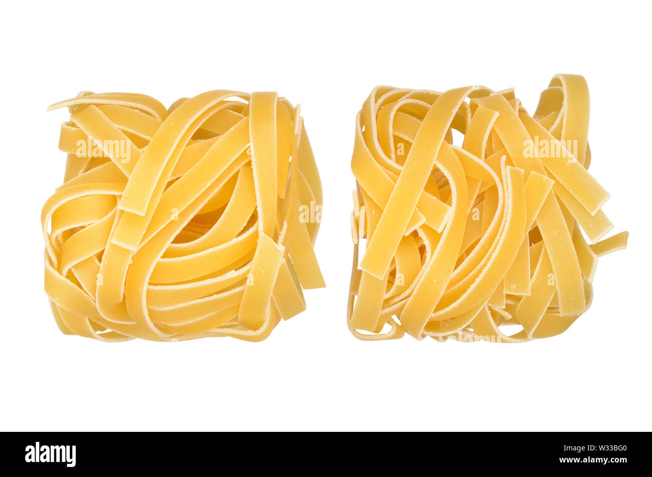 Tagliatelle pasta isolated on white background. With clipping path Stock Photo