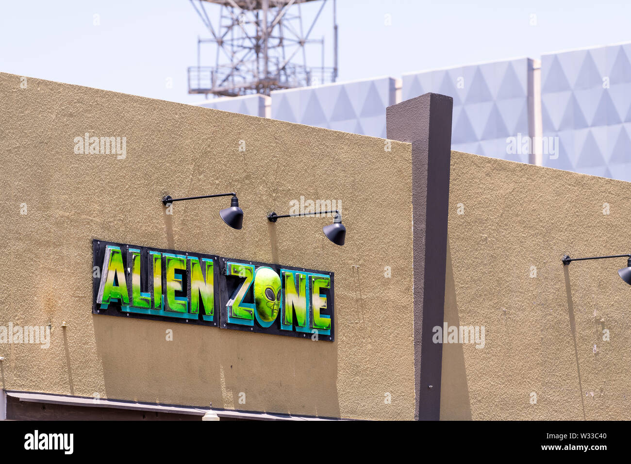 Roswell, USA - June 8, 2019: Main street in New Mexico town city alien sightings and store shop sign for alien zone Stock Photo