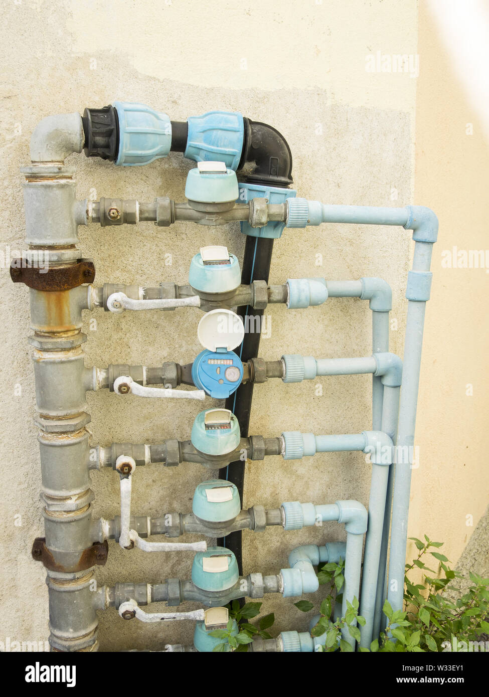group of flow meters valves, pipes and fittings for water supply system