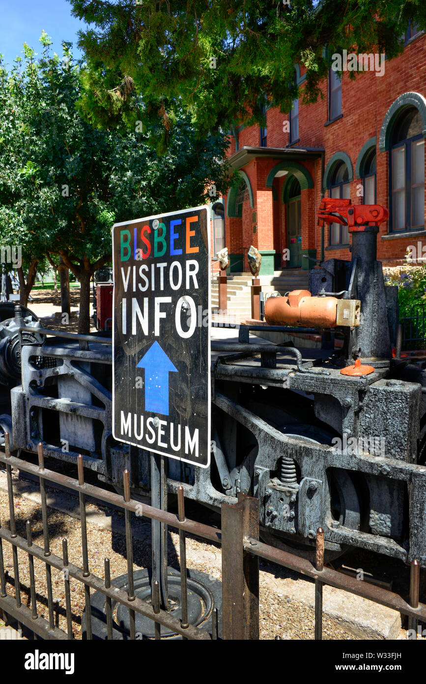 A sign for Bisbee Visitor Info and Bisbee Mining and Historical museum in small town America, the old mining town of Bisbee, AZ Stock Photo