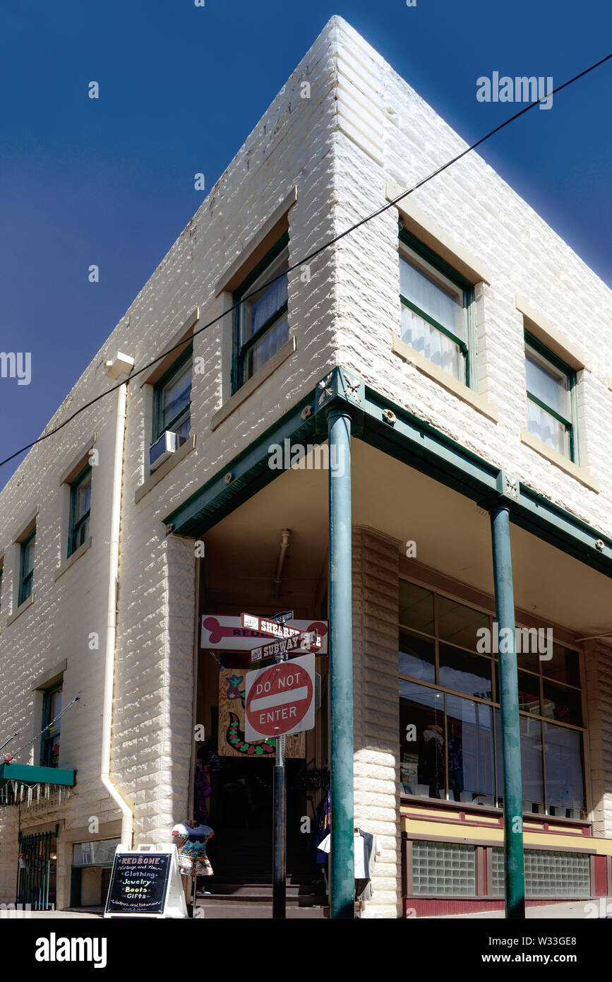 The textural and cool Allen Block building houses Redbone boutique on the ground floor and the Canyon Rose Suites upstairs in old mining town of Bisbe Stock Photo