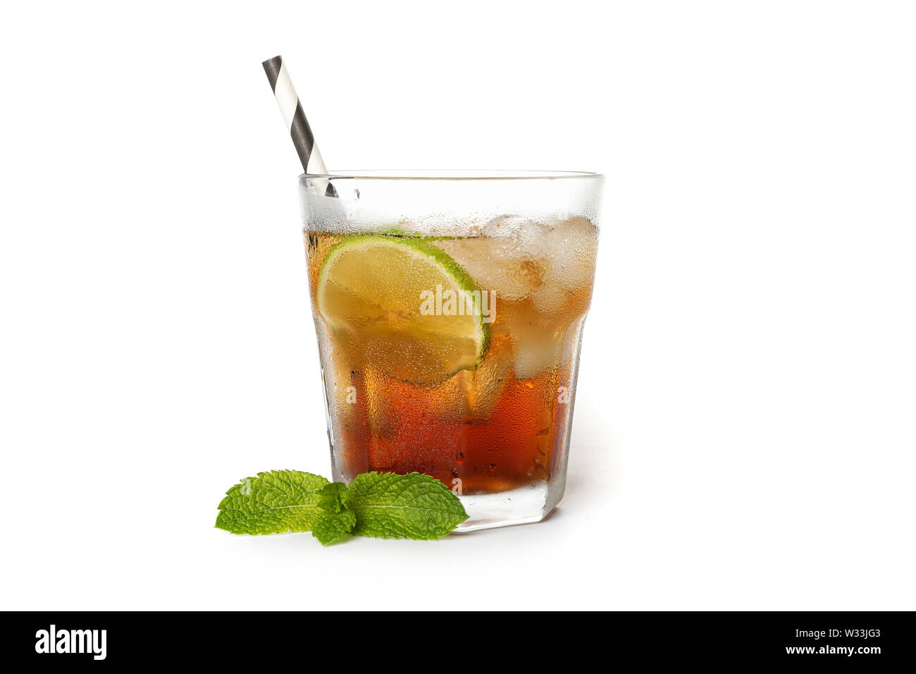 Glass of cold cola with lime isolated on white background Stock Photo ...