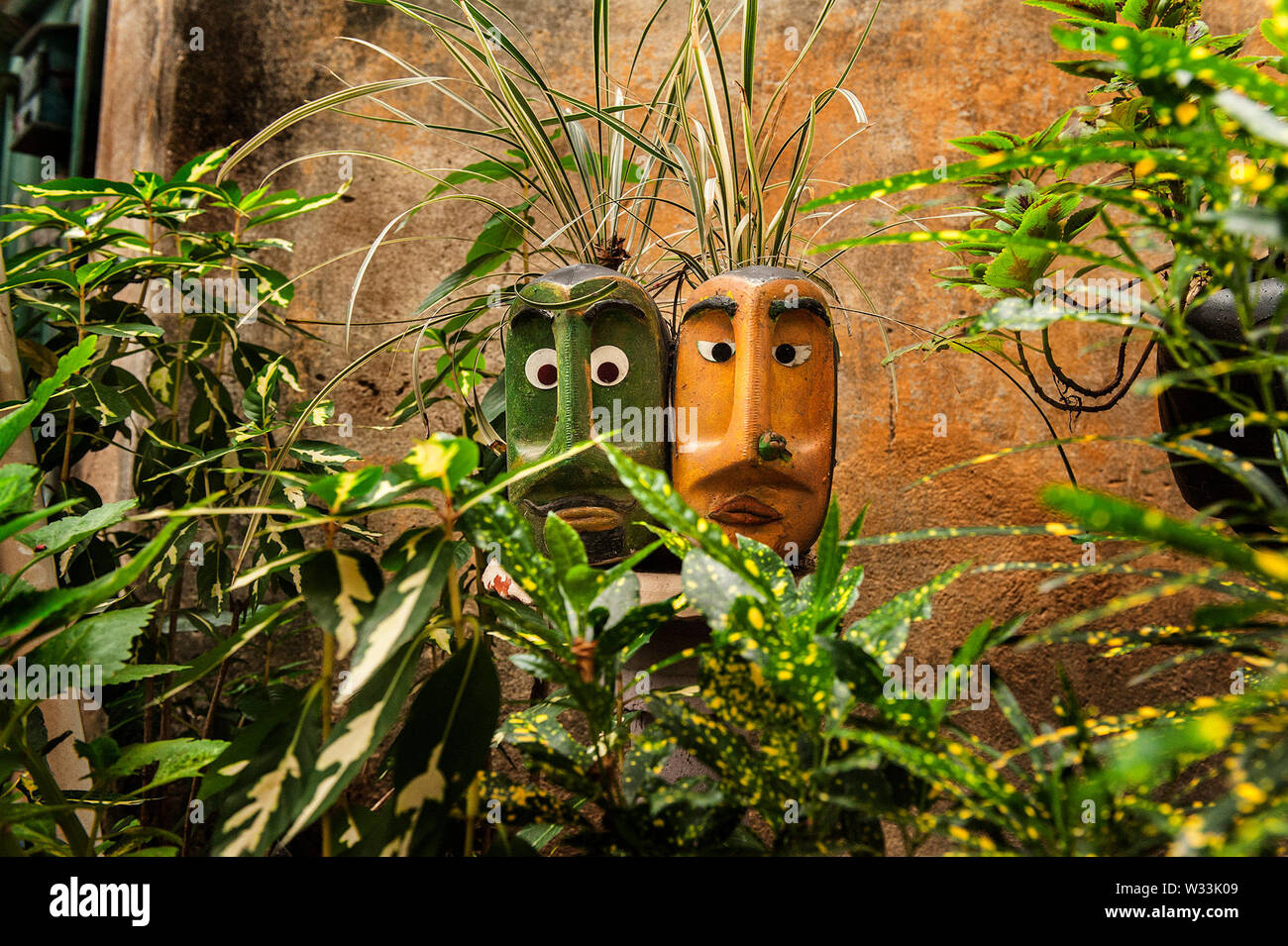 Kolkata. 12th July, 2019. Decorated pots and plants made by gardener Partha Sarathi Ganguly, 65