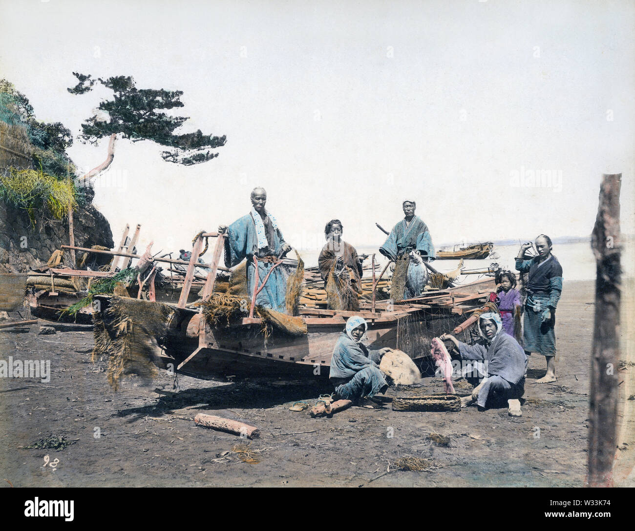 [ 1890s Japan Japanese Fishermen and Boat ] — Fishermen show off their catch on their beached