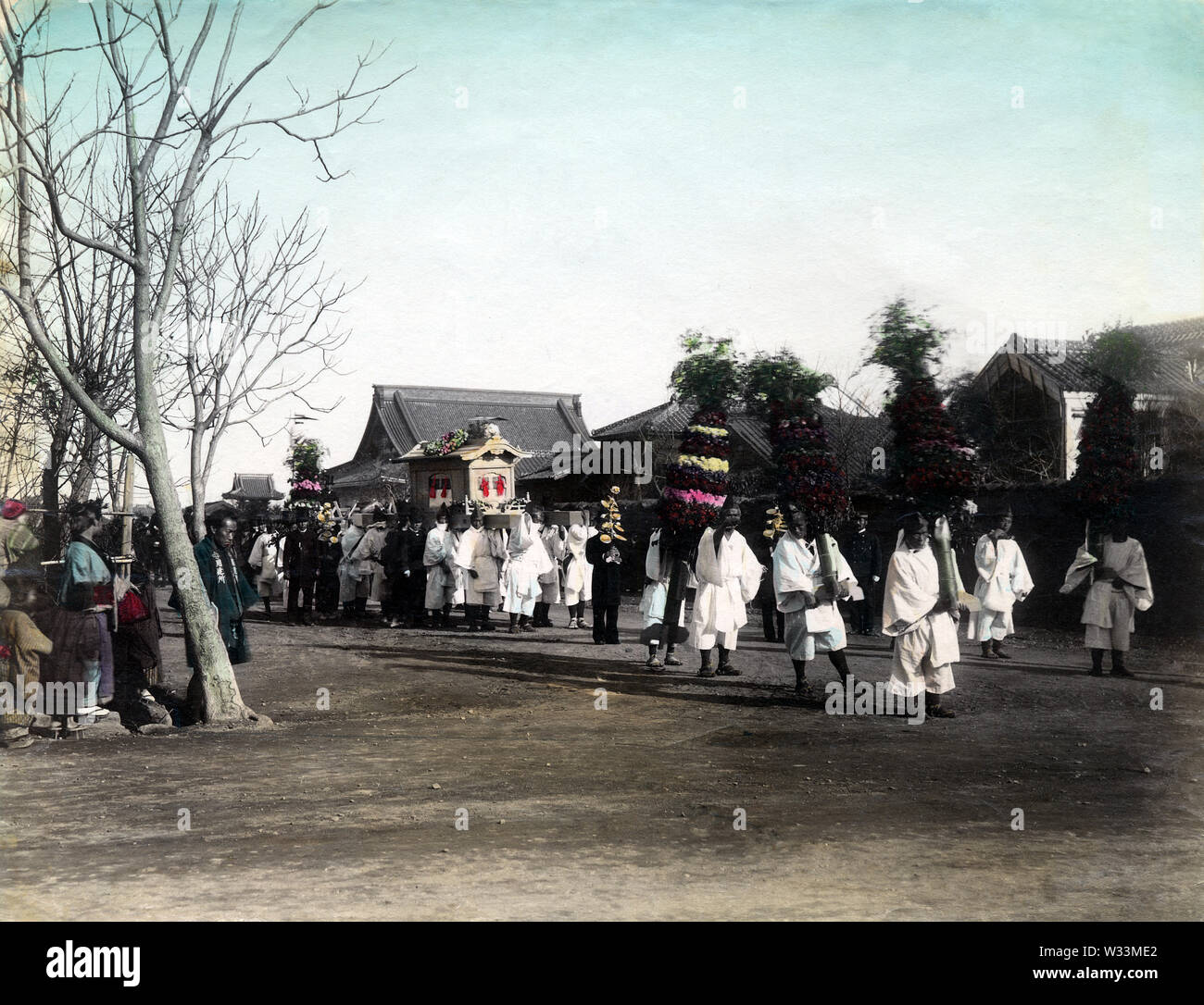 [ 1890s Japan - Japanese Funeral Procession ] —   Funeral procession on the street.  19th century vintage albumen photograph. Stock Photo