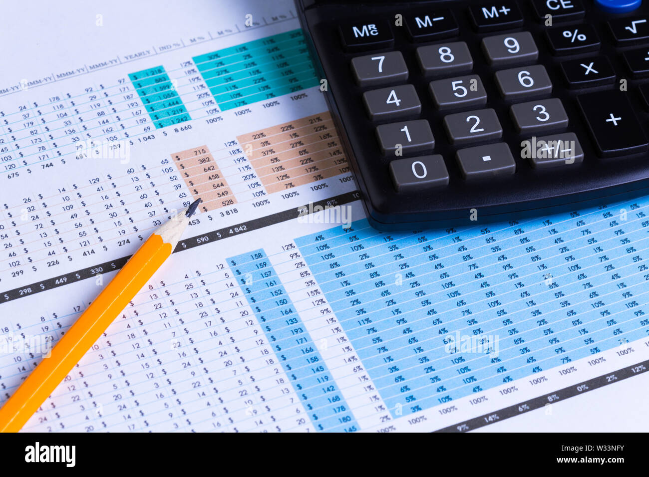 Graphs and Calculator Stock Photo - Alamy