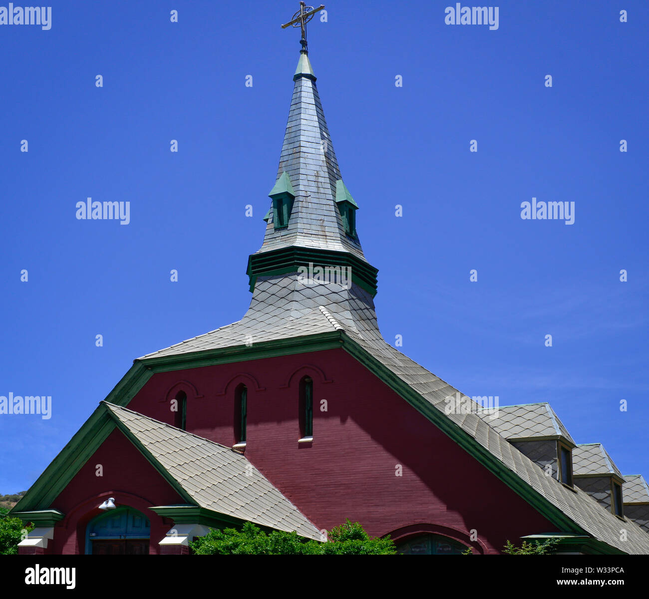 The steeple is a landmark icon of the impressive Covenant Presbyterian Church, in the old mining town of Bisbee, AZ USA Stock Photo