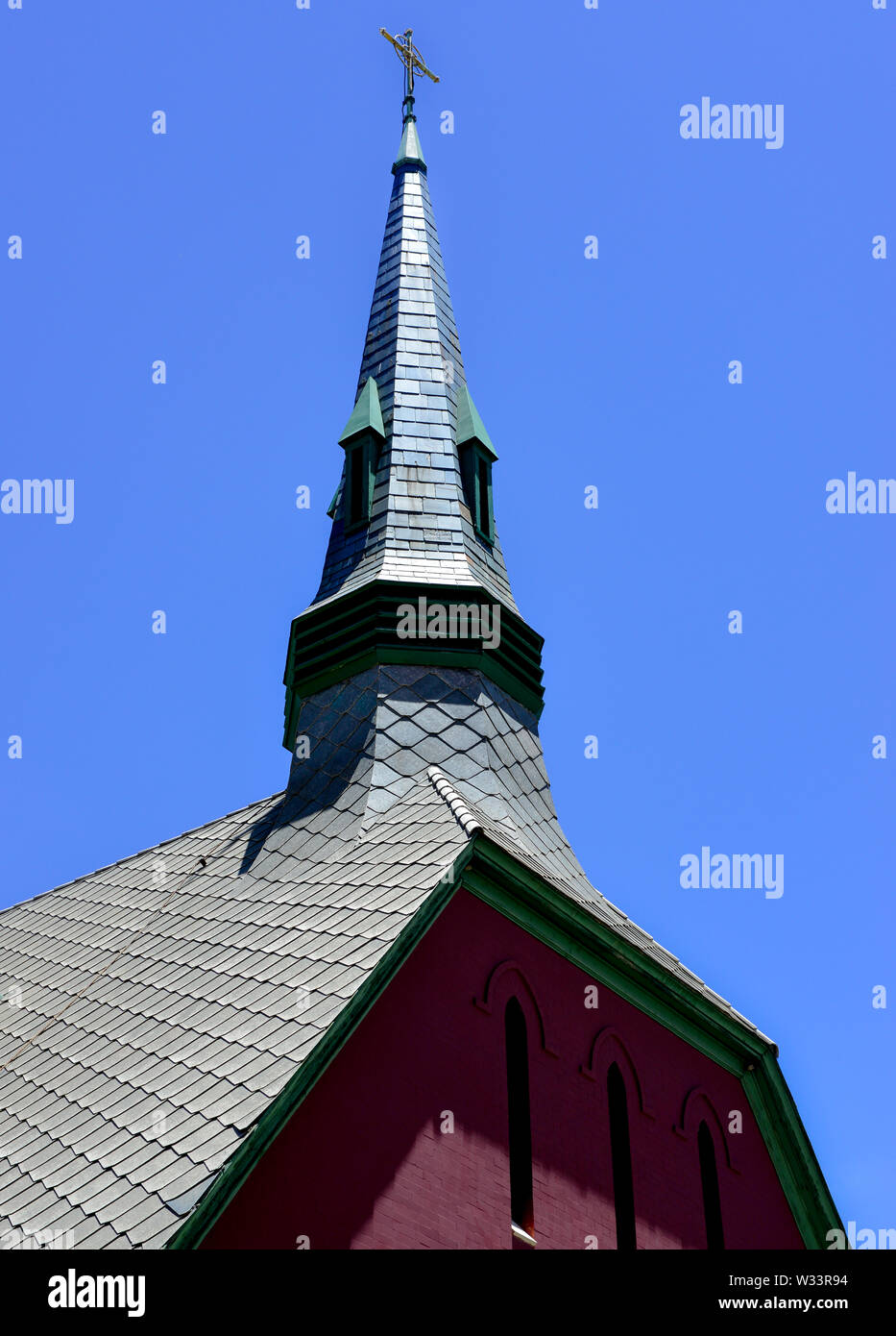 Close up of The impressive Convenant Presbyterian Church with it's brick construction and tall steeple in the old mining town of Bisbee, AZ, USA, Stock Photo