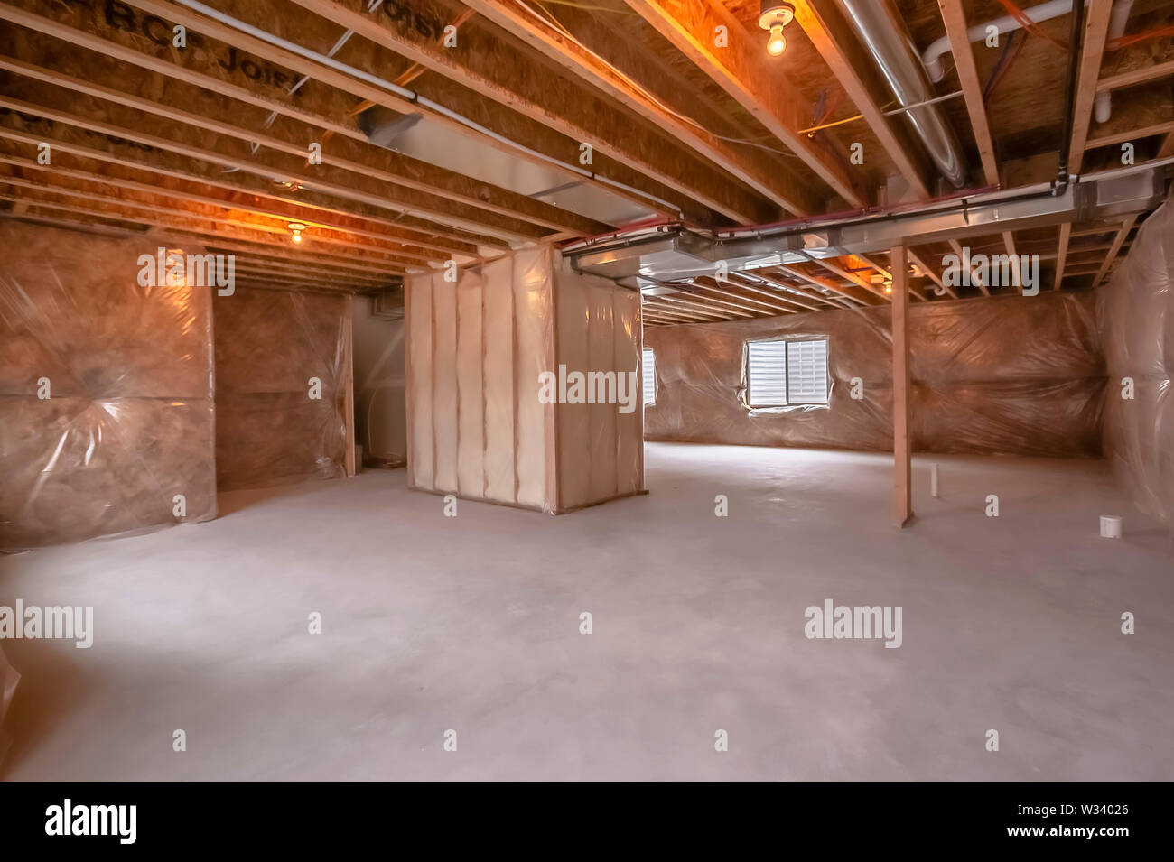 Home Under Construction With Interior Framing Beams And
