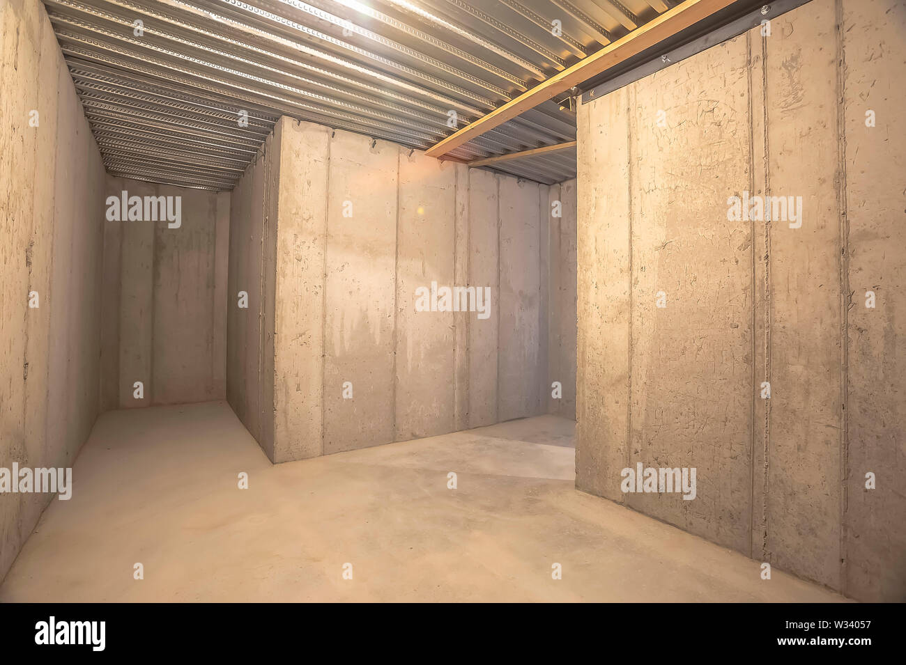 Interior Of An Empty Building With Concrete Wall And