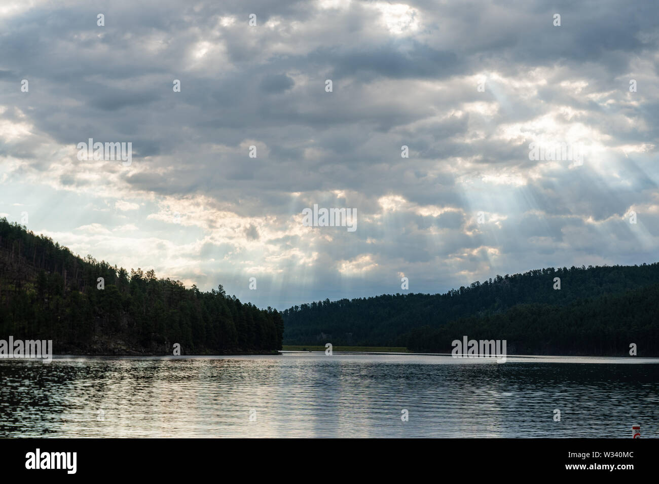 Sheridan Lake, in South Dakota's Black Hills, early in the Morning, after a thunder storm had passed over the area. Stock Photo