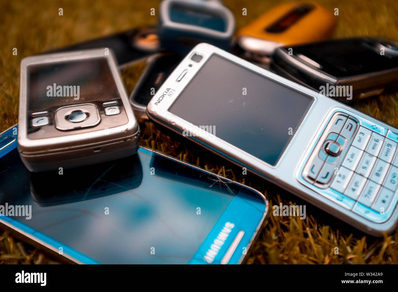 Selection of old mobile cell phones from the mid 2000's before the introduction of Smartphones Stock Photo