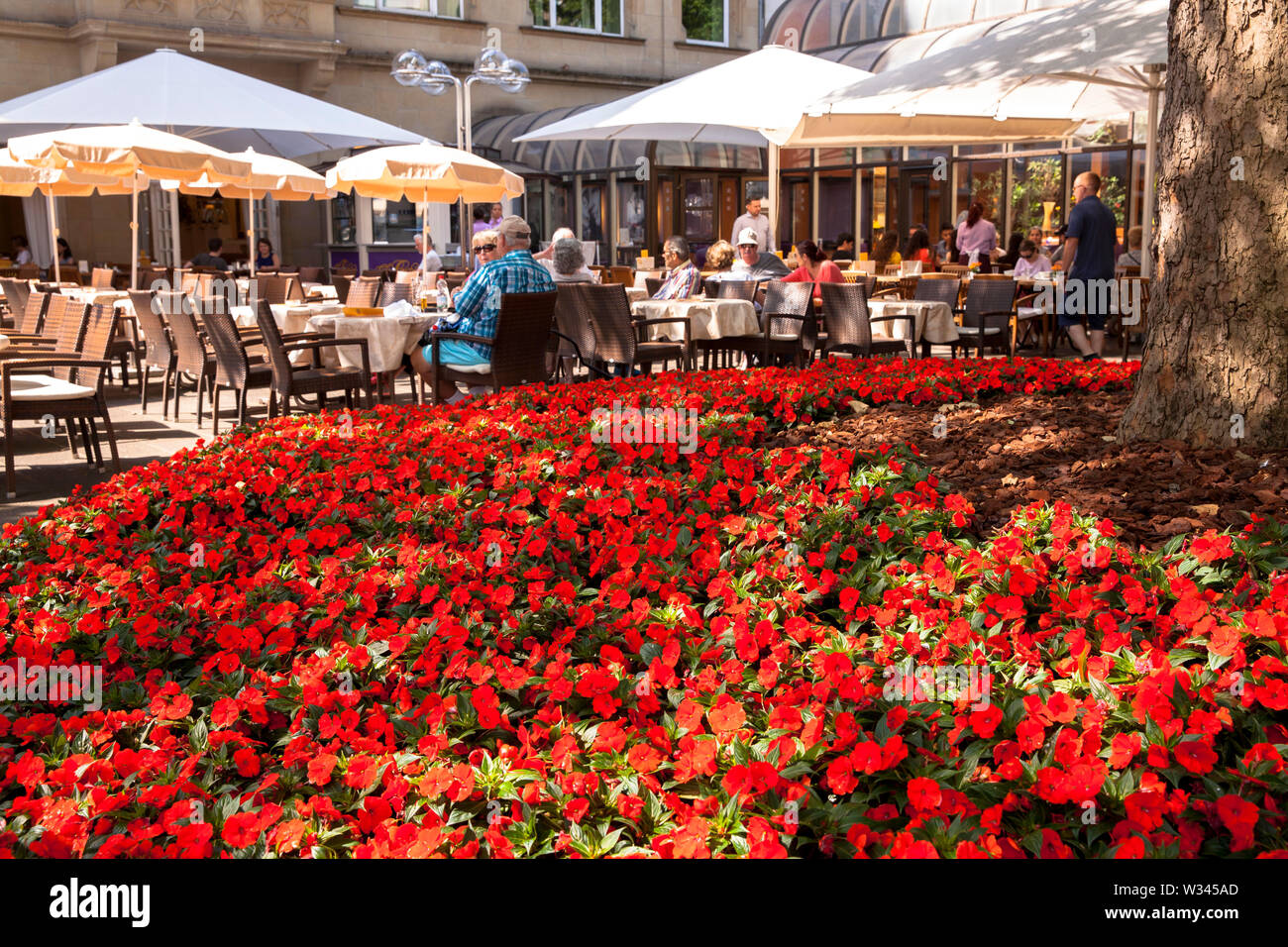 terrace of the Cafe Reichard near the cathedral, Cologne, Germany.  Terrasse des Cafe Reichard am Dom, Koeln, Deutschland. Stock Photo