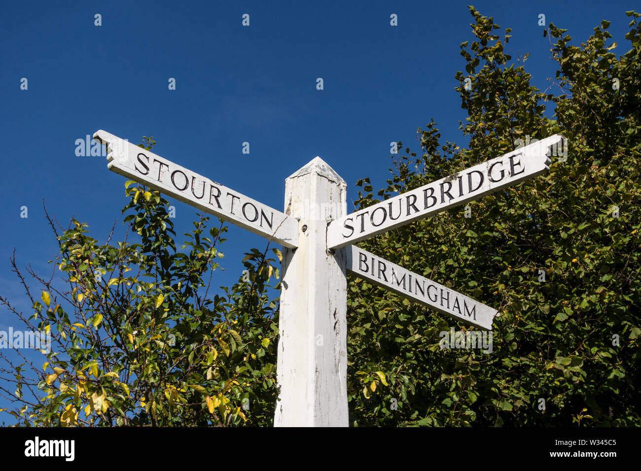 Signpost pointing directions to Stourton, Stourbridge and Birmingham, West Midlands, UK Stock Photo