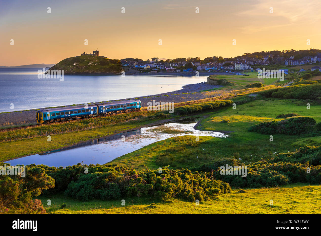 Summers evening last train of the day at Criccieth, North Wales. Stock Photo