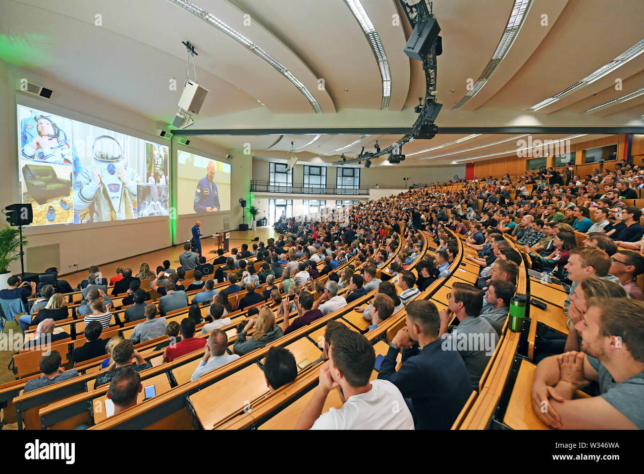 Karlsruhe, Germany. 12th July, 2019. Astronaut Alexander Gerst gives a  lecture at the Karlsruhe Institute of Technology (KIT). He was previously  awarded an honorary doctorate there. Gerst received his diploma in  geophysics