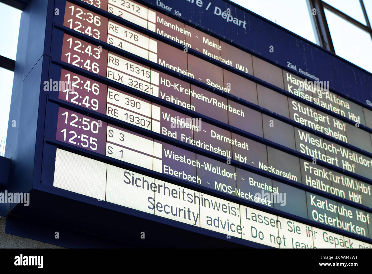 Heidelberg, Germany - June 2019: Digitail train departure plan display on screen at German main station Stock Photo